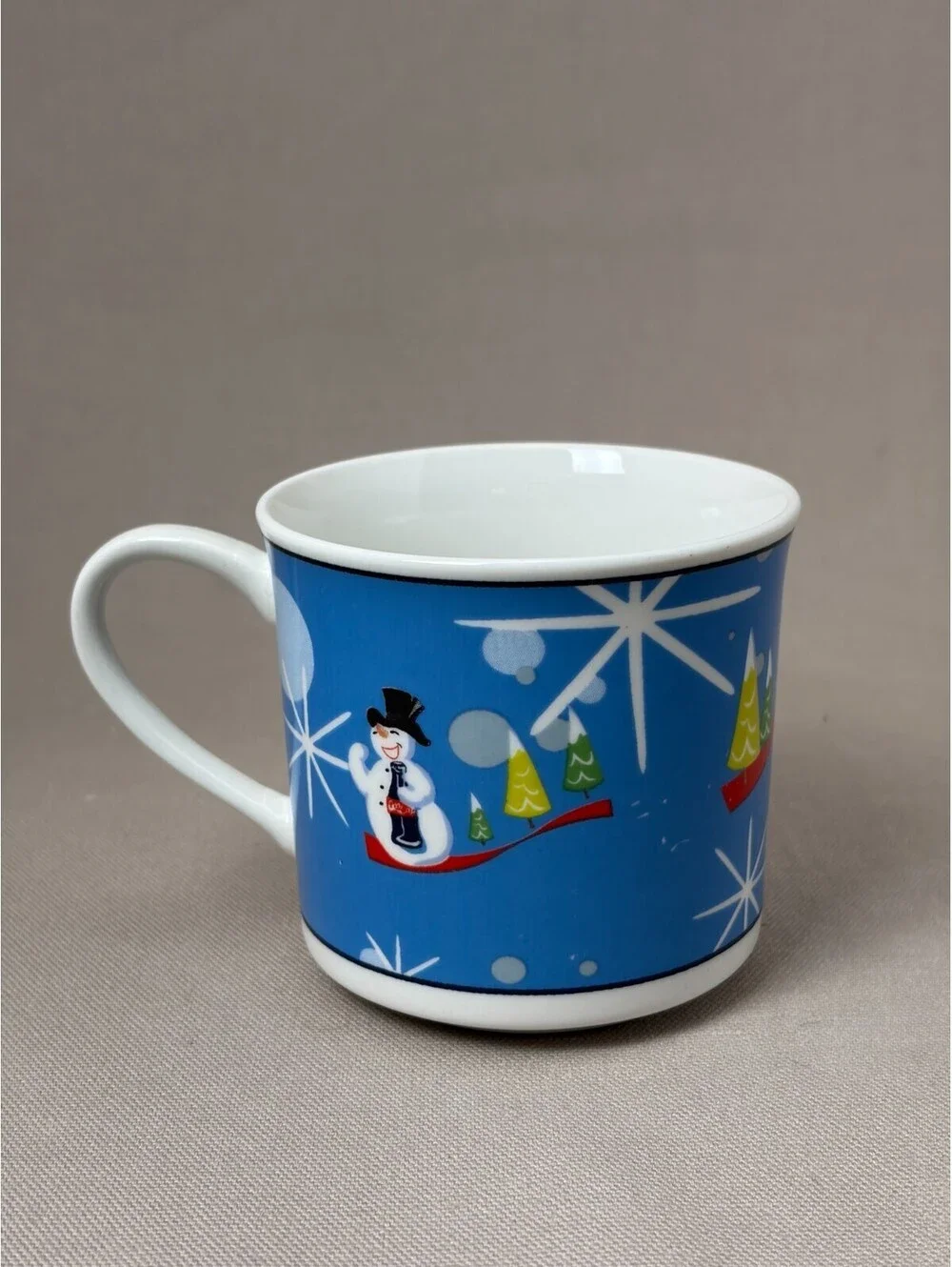 Coca Cola Laughing Snowman Coffee Mug Blue Christmas Retro Starburst Cup 10oz